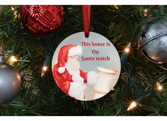This house is on Santa watch tree decoration