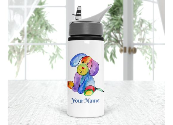 Toy dog drinks bottle